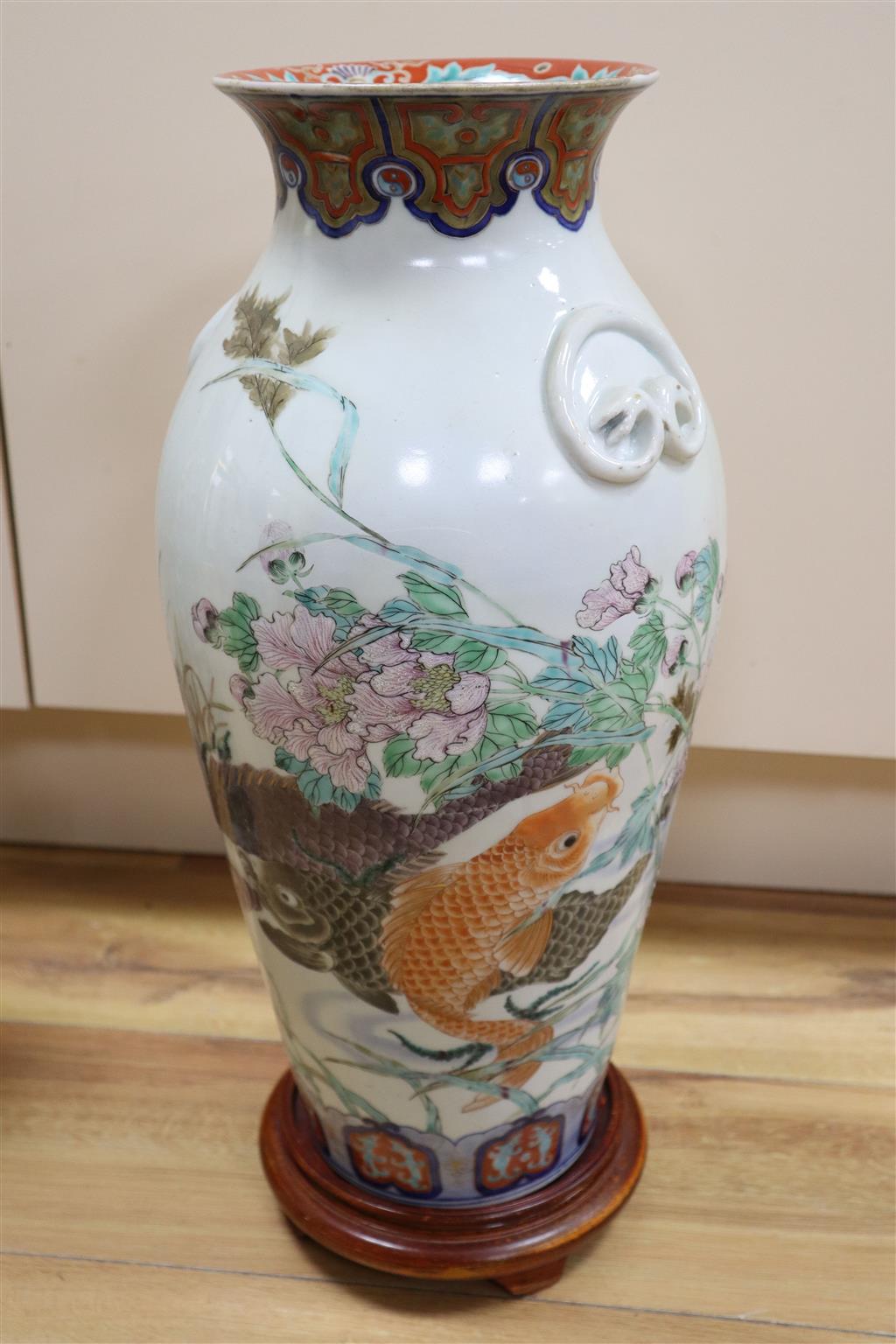 Eliza Simmance -a Doulton reticulated silicon ware vase, a Chinese lidded vase, a Japanese fish decorated vase, 59cm
